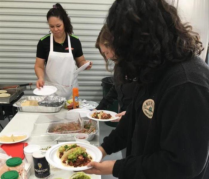 Team members grabbing some tacos!