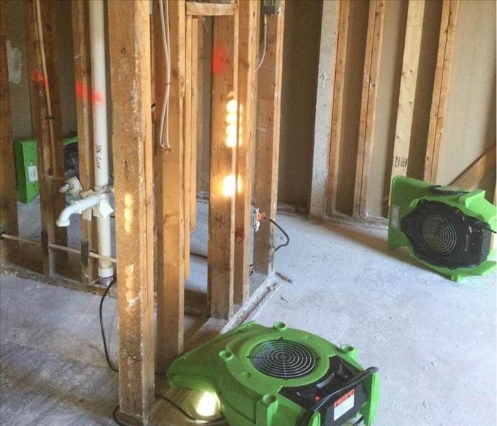 Drying equipment on floor.