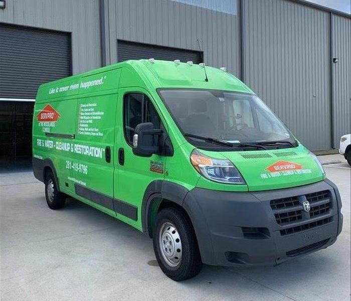 a green SERVPRO van