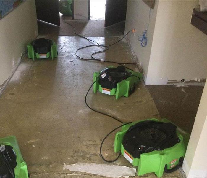 Drying equipment on floor.